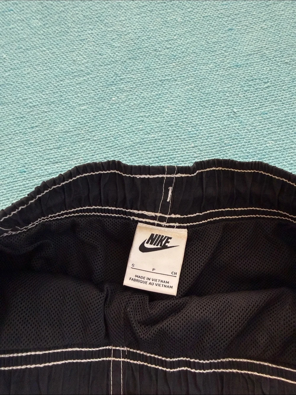 Nike Black Athletic Shorts with White Swoosh Accents S